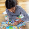 The Day at the Museum Science 48 piece puzzle will transport you to a fun filled day at the Museum. This observation puzzle features lots of experiments that are happening at the museums and lots of kids having a blast!