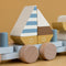 This wooden train has 3 carriages to stack with a fisherman’s boat, sailboat and cheeky seagull. Challenge your little one to create different combinations to support hand-eye coordination and fine motor skills. It also makes a nice accessory for the nursery or playroom.