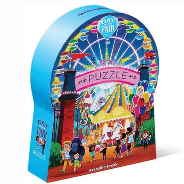 The Day at the Fair 48 piece puzzle from Crocodile Creek will transport you to a fun filled day at the carnival. This observation puzzle features lots of activities that are happening at the fair, including a ferris wheel, a carousal and lots of kids having a blast!