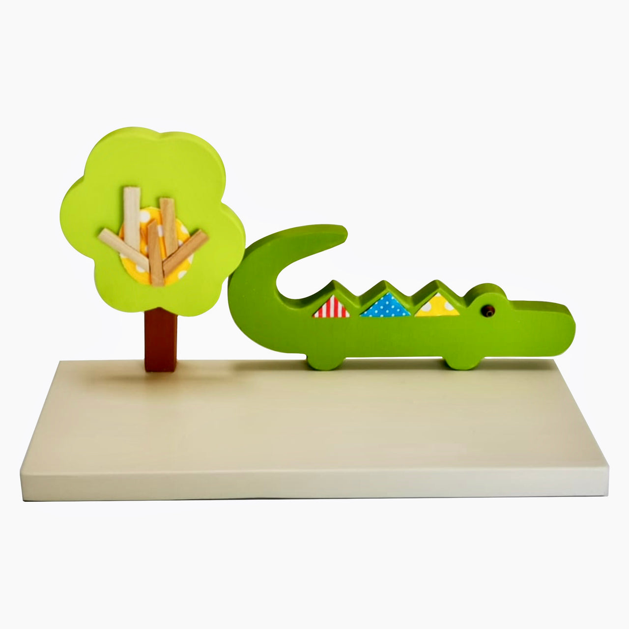 Designed and hand-crafted in Italy, this display shelf with a neutral painted wooden base and crocodile design will bring colour and imagination to your child's bedroom.  Creatively constructed from wood and layered fabric, the vibrant crocodile design is stunning. A quirky and practical way to display items in your child's bedroom. Matches similar products on Rooms for Rascals. 