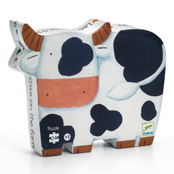  Children learn about farm animals. A superb 24-piece puzzle in a stylish cow-shaped box. Decorative shaped box for the child’s bedroom.