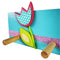 This hand-crafted coat rack has a bright blue wooden base with a colourful flower and butterfly design layered on top. Creatively constructed from wood and layered fabric, the vibrant flower design is stunning. It has three wooden pegs for keeping your children's clothes organised.