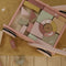 The little dutch block pink trolley is equipped with wooden wheels and filled with coloured wooden blocks featuring beautiful drawings of flowers and insects from the Wild Flowers collection. The different sizes of the blocks promotes children's recognition of colours and shapes. The handle is at the right height for toddlers to walk around the room. This trolley filled with blocks guarantees hours of building fun.
