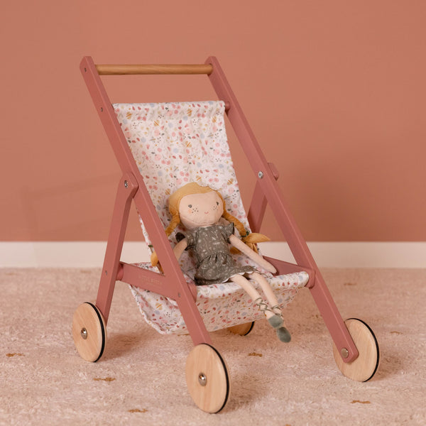 Take your doll for a walk! The wooden doll stroller is decorated with the enchanting Flowers & Butterflies collection. The solid frame is beautifully finished, and the wooden wheels have a rubber rim for extra protection. The stroller can be pushed smoothly. 
