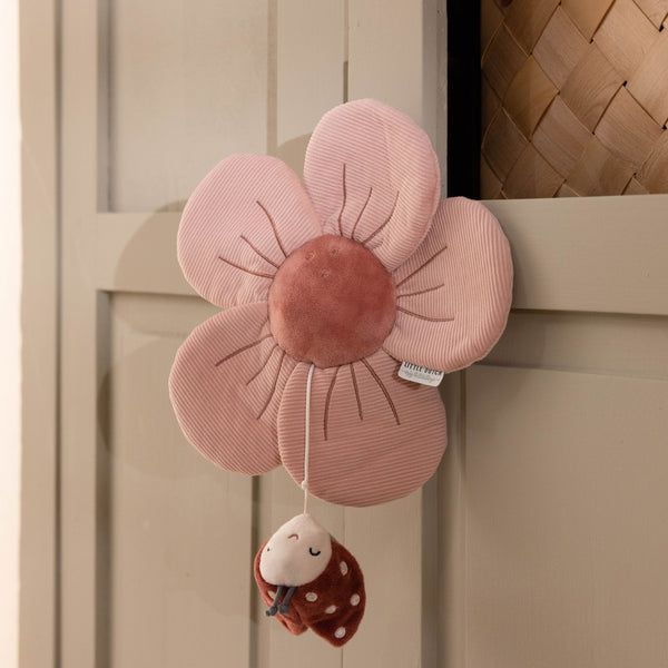 Off to dreamland. Make sure to include this flower-shaped music box when you set up the nursery. It will help your baby to calm down and fall asleep. Plus, it develops your baby’s imagination and adds to the senses of sight and hearing. Pull down the ladybug and a soothing melody starts playing. Hang the music box above everything from crib to changing table.