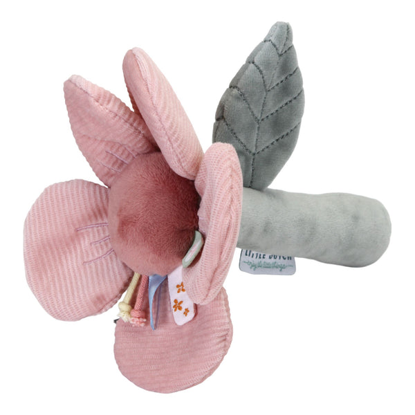 his super-soft rattle toy in the shape of a dainty flower is a real treat for your little one. It makes a fun rattling sound whenever your baby plays with it. The captivating toy is further enriched with beautifully illustrated labels, cute corduroy leaves, and colourful cotton rope knots. 