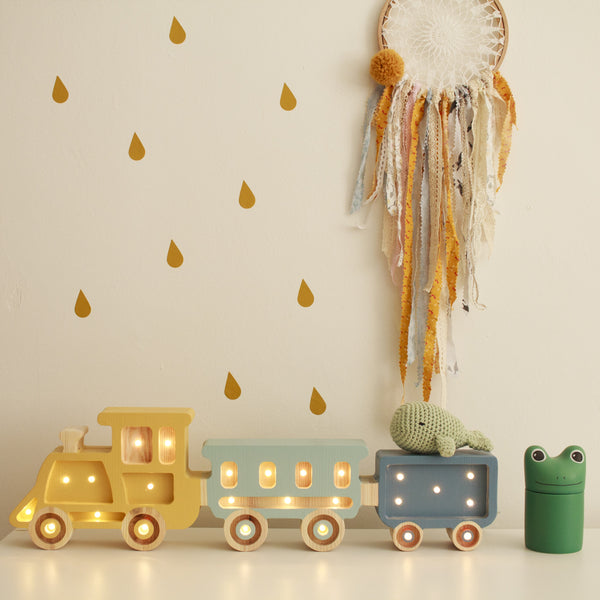 This high-quality train children’s night light is made of 100% natural pine wood. Little Lights are created by hand in a small factory in Krakow. It is not only a beautiful object for everyday use, but also a keepsake that will last throughout childhood and remain in the family for generations.