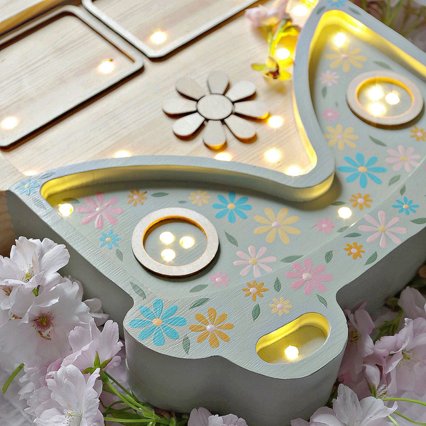 This high-quality retro van covered in petite hand painted little flowers night light is made of 100% natural pine wood. Little Lights are created by hand in a small factory in Krakow. It is not only a beautiful object for everyday use, but also a keepsake that will last throughout childhood and remain in the family for generations.