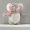 Delightful penguin toy in grey herringbone tweed with a white bib front wearing a  cute pair of large fluffy pink ear muffs and and a scarf.  A lovely gift for a newborn or child.