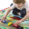 This colorful fun road rug from Melissa and Doug comes with four colorful wooden cars to drive on looping streets and lanes. 