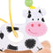 This wooden cow has two wooden arches at the base and is easily rocked by small children and babies. The yellow wire bead frame goes around and through the middle of the cow with enough space for the rainbow coloured beads to be pushed through. Made from high quality, responsibly sourced materials.