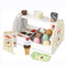Scoop up some tasty treats with this 28-piece pretend play ice cream counter from Mellissa and Doug! The sturdy wooden tabletop counter holds eight wooden scoops of different-flavored ice cream, six assorted toppings, two cones, a plastic cup, an ice cream scooper, tongs, and a wooden spoon.